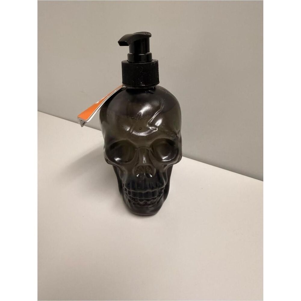 Stylish black skull pump dispenser for soap or lotion. Multi Decor-home-accesori